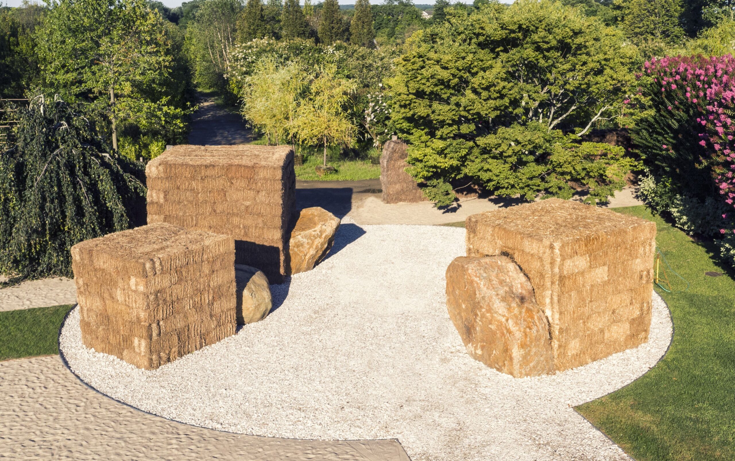 PERMANENT TRANSIENCE, 2016, a site-responsive installation, 3 cubic forms made of hay bales with metal armatures; 11 ft H x 52 ft diameter; Marders Nursery, Bridgehampton, NY; Parrish Road Show, Parrish Art Museum Olga Goworek photography Olga Goworek photography