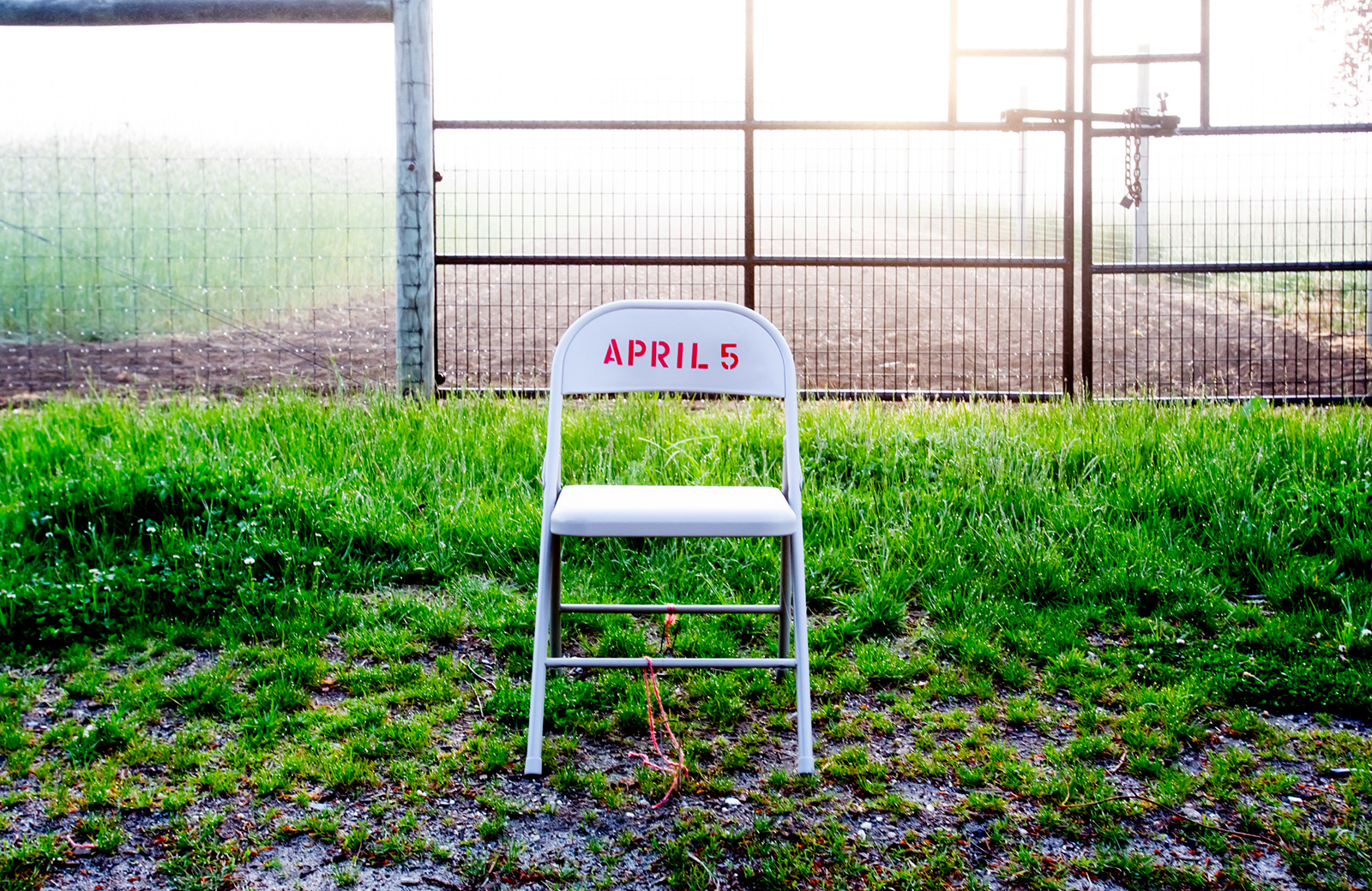 WHEN, 2020 detail: April 5 chair along roadway Phillip Cheng Photography